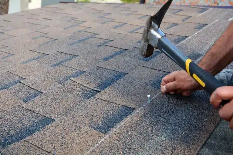 how to replace roof shingles nailing down rooftop shingle