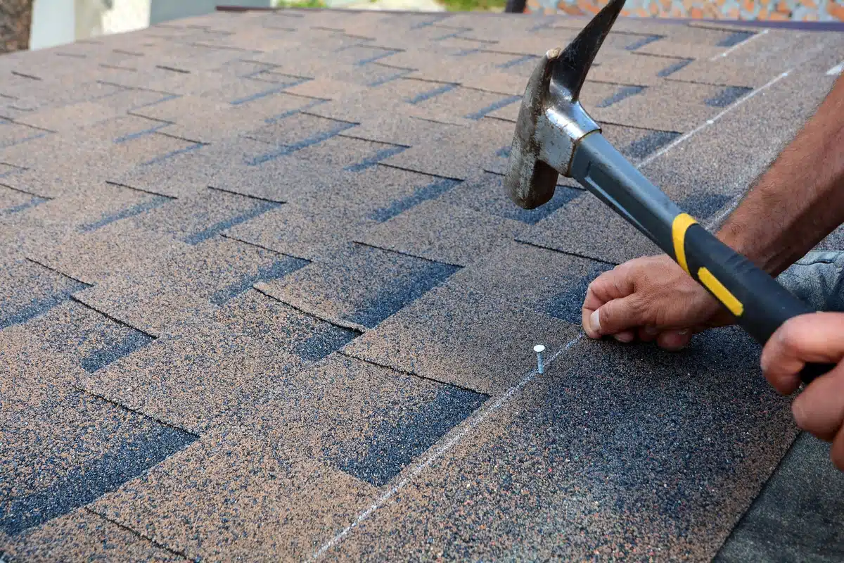 how to replace roof shingles nailing down rooftop shingle