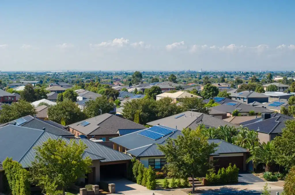 shingle and metal roofs in residential neighborhood