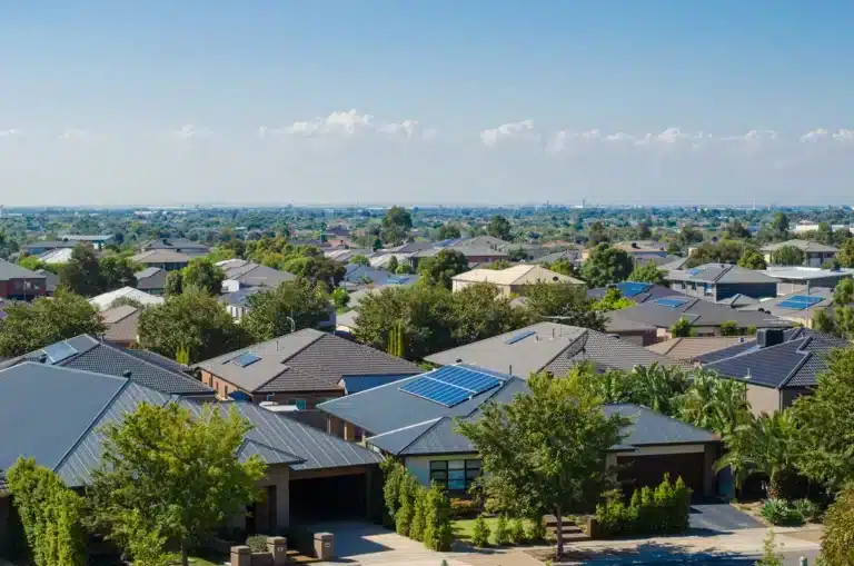 shingle and metal roofs in residential neighborhood