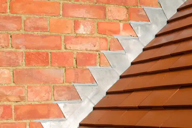 roof flashing between wall and tiles