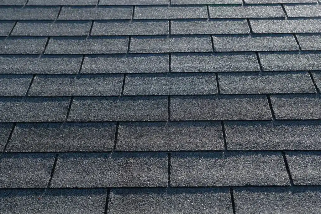 Close up view of 3 tab shingles installed on roof