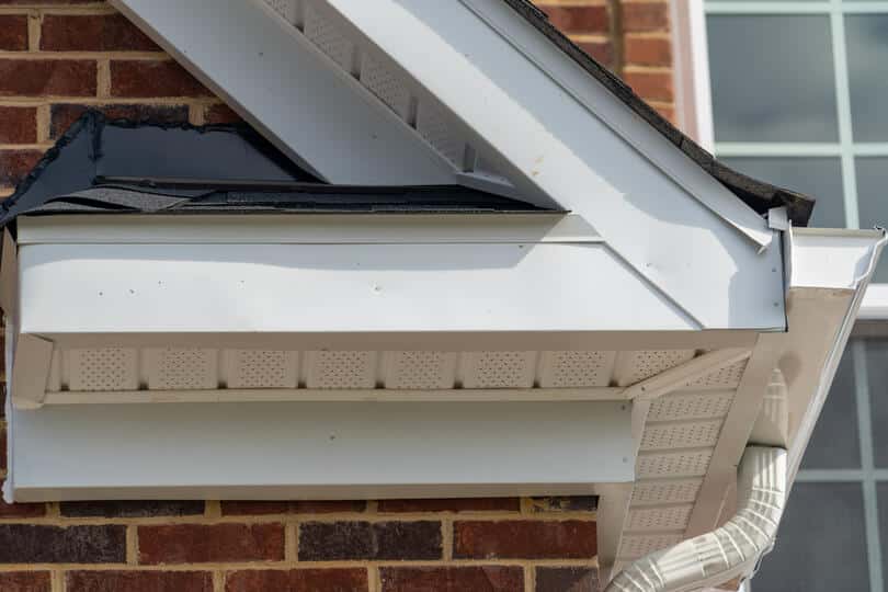 how to install drip edge-close up image of parts of a roof including drip edge, soffits, gutters